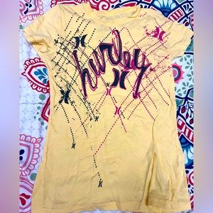 Hurley t-shirt. Yellow, black, & pink. US size S. Medium wear, good condition.